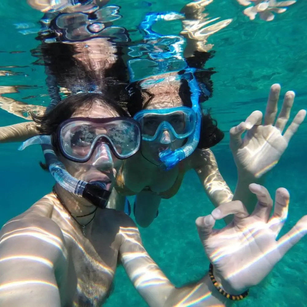 young couple snorkeling